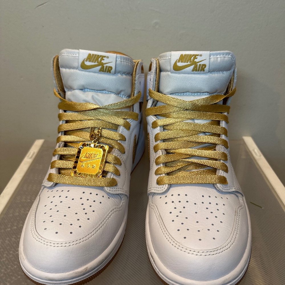 Brand new gold Nike high tops
